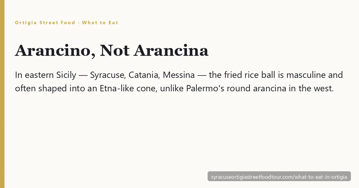 What to eat in Ortigia Syracuse — a freshly fried Sicilian arancino cone street food